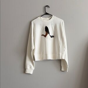 Cropped Cream Sweatshirt with Flying Duck Graphic